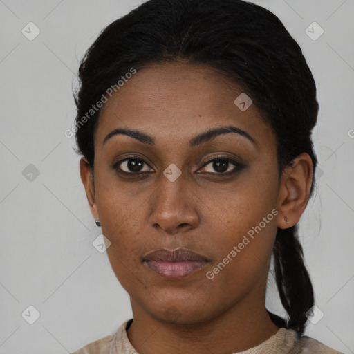 Neutral black young-adult female with medium  black hair and brown eyes