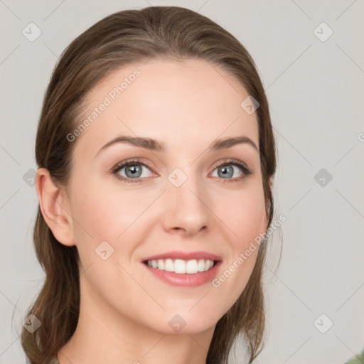 Joyful white young-adult female with medium  brown hair and green eyes