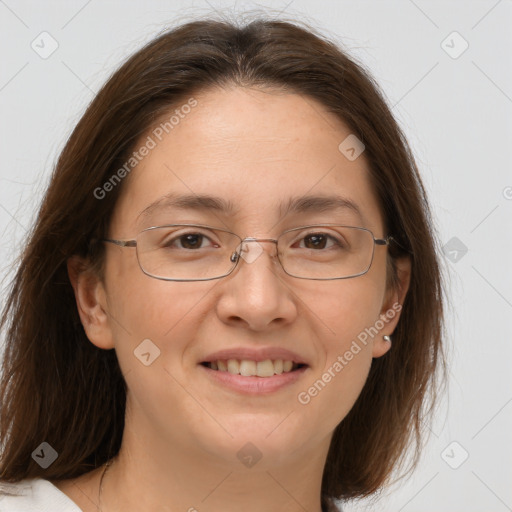 Joyful white adult female with medium  brown hair and brown eyes