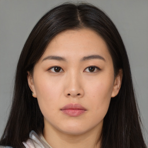 Neutral asian young-adult female with long  brown hair and brown eyes