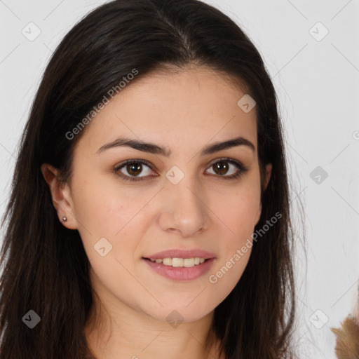 Joyful white young-adult female with long  brown hair and brown eyes