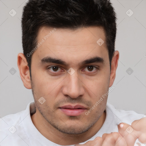 Neutral white young-adult male with short  brown hair and brown eyes