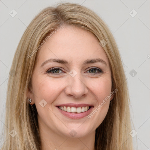 Joyful white young-adult female with long  brown hair and brown eyes