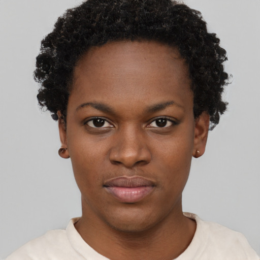 Neutral black young-adult female with short  black hair and brown eyes