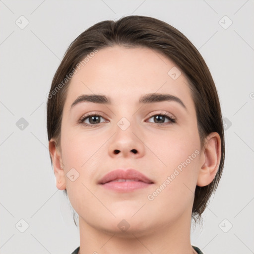 Neutral white young-adult female with short  brown hair and brown eyes