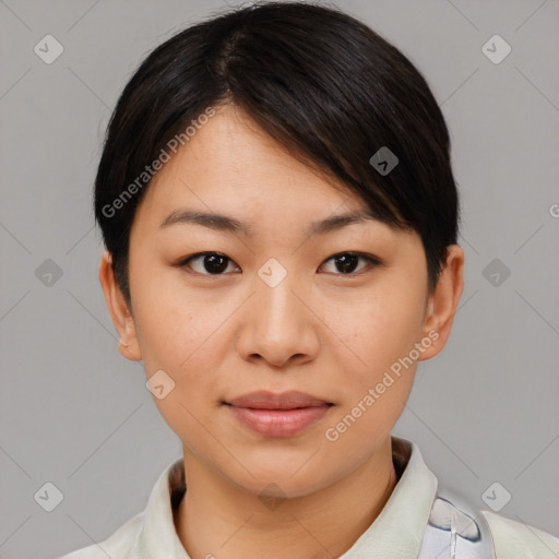 Joyful asian young-adult female with short  brown hair and brown eyes