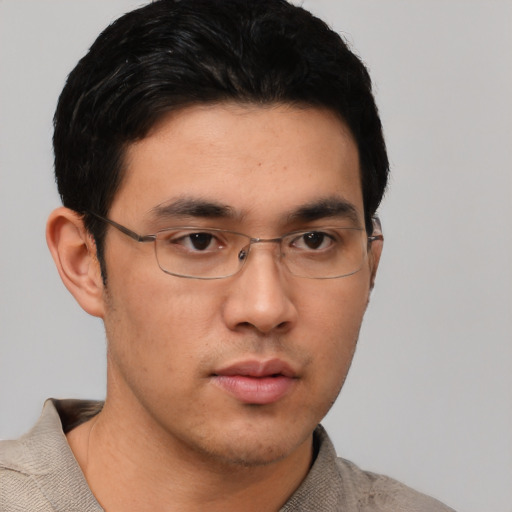 Neutral asian young-adult male with short  black hair and brown eyes