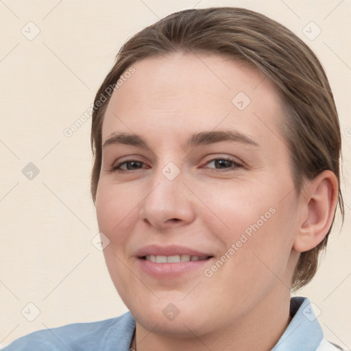 Joyful white young-adult female with medium  brown hair and brown eyes