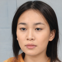 Neutral asian young-adult female with medium  brown hair and brown eyes