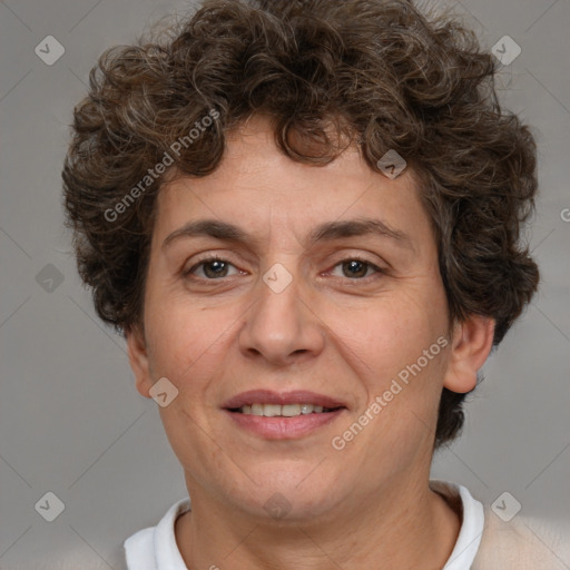 Joyful white adult female with short  brown hair and brown eyes