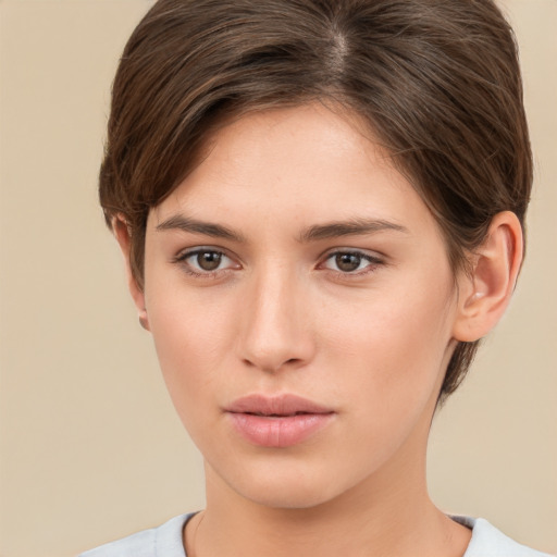 Neutral white young-adult female with short  brown hair and brown eyes