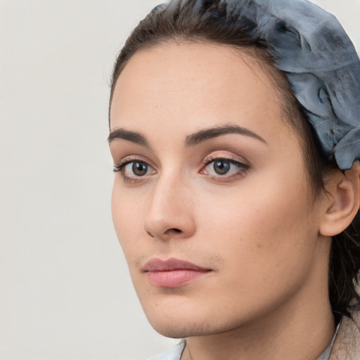 Neutral white young-adult female with medium  brown hair and brown eyes