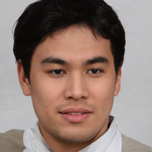 Neutral asian young-adult male with short  brown hair and brown eyes