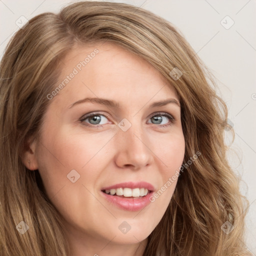 Joyful white young-adult female with long  brown hair and blue eyes