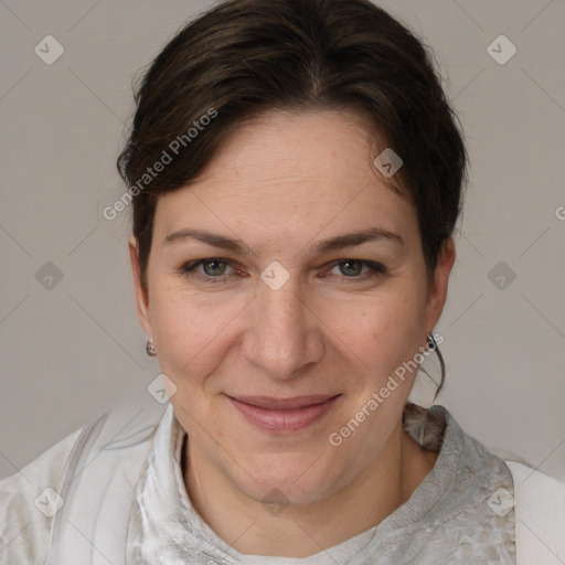 Joyful white adult female with medium  brown hair and grey eyes