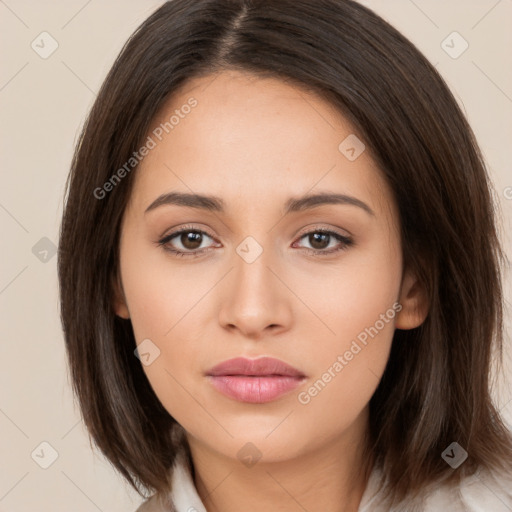 Neutral white young-adult female with long  brown hair and brown eyes