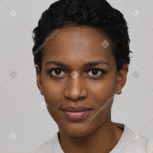 Joyful black young-adult female with short  black hair and brown eyes