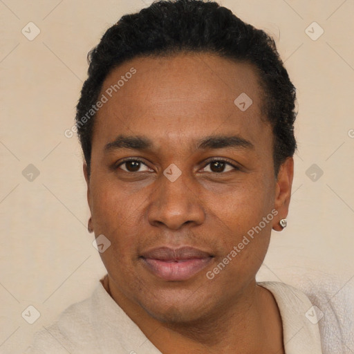 Joyful black young-adult male with short  black hair and brown eyes