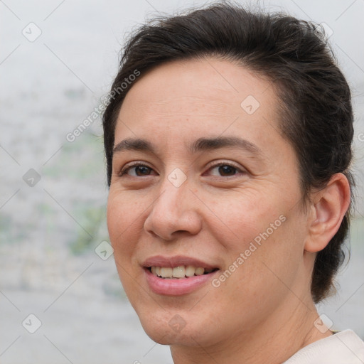 Joyful white adult female with short  brown hair and brown eyes