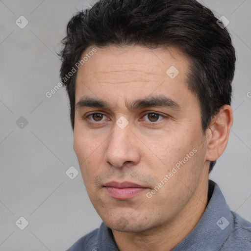 Neutral white adult male with short  brown hair and brown eyes