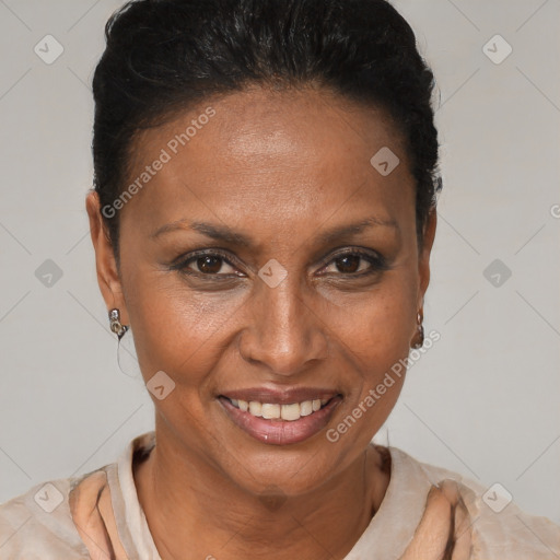 Joyful black adult female with short  brown hair and brown eyes