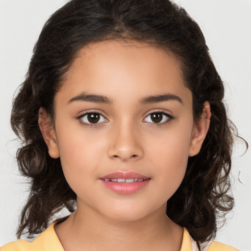 Joyful white child female with medium  brown hair and brown eyes