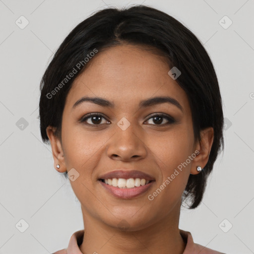 Joyful latino young-adult female with short  brown hair and brown eyes