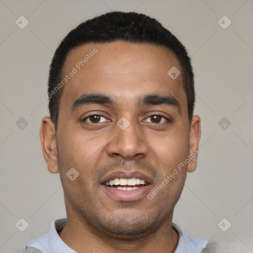 Joyful black young-adult male with short  black hair and brown eyes