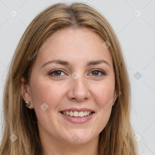 Joyful white young-adult female with long  brown hair and grey eyes