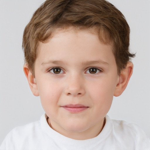 Joyful white child male with short  brown hair and brown eyes