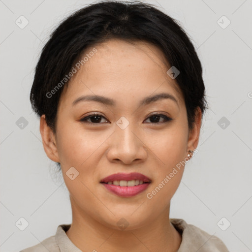 Joyful asian young-adult female with short  brown hair and brown eyes