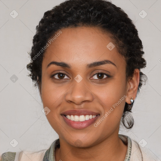 Joyful latino young-adult female with short  black hair and brown eyes