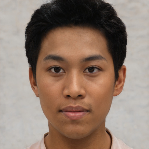 Neutral asian young-adult male with short  black hair and brown eyes