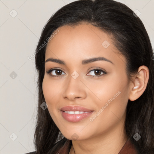 Joyful latino young-adult female with long  black hair and brown eyes