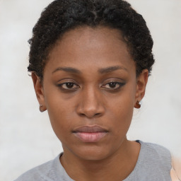 Neutral black young-adult female with short  brown hair and brown eyes