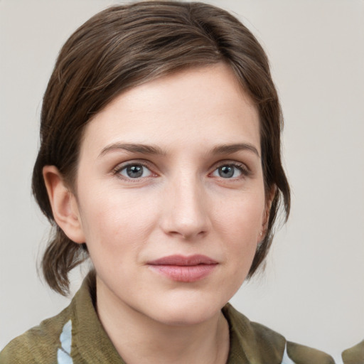 Neutral white young-adult female with medium  brown hair and grey eyes