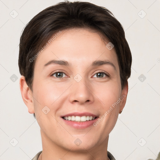 Joyful white young-adult female with short  brown hair and grey eyes