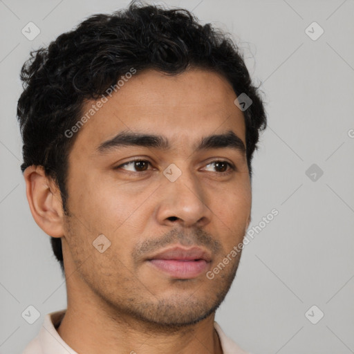 Neutral latino young-adult male with short  brown hair and brown eyes