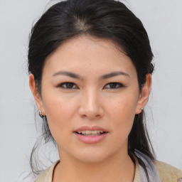 Joyful asian young-adult female with medium  brown hair and brown eyes