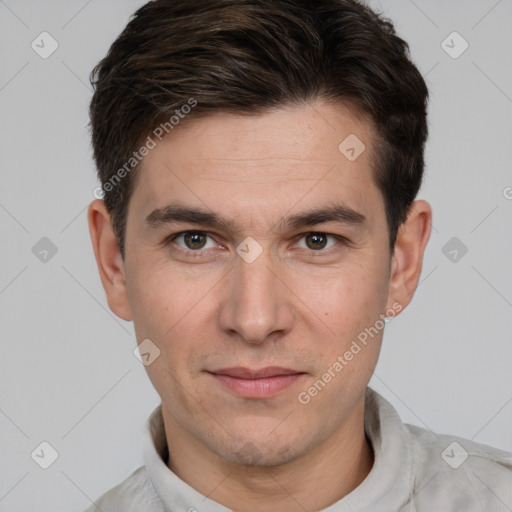 Joyful white young-adult male with short  brown hair and brown eyes