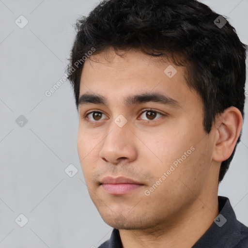 Neutral white young-adult male with short  black hair and brown eyes