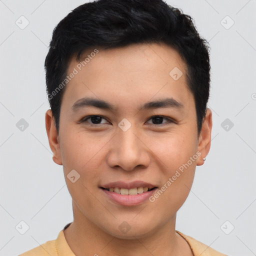 Joyful asian young-adult male with short  brown hair and brown eyes