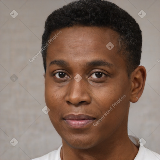 Joyful black young-adult male with short  black hair and brown eyes