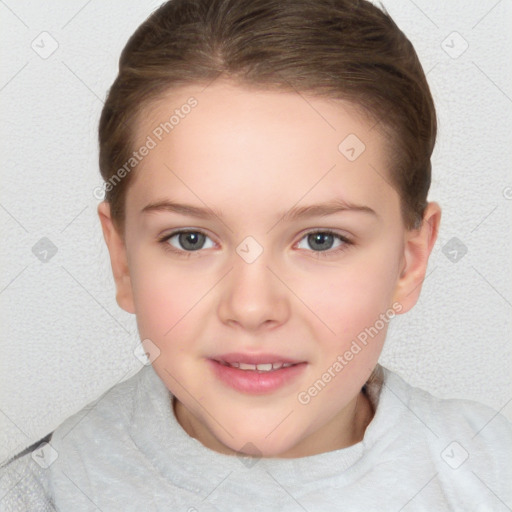 Joyful white child female with short  brown hair and brown eyes