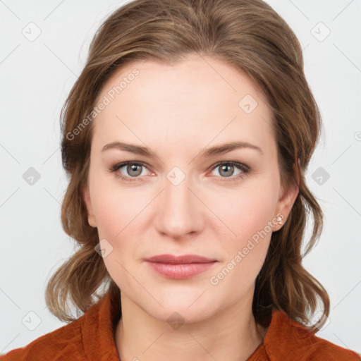 Joyful white young-adult female with medium  brown hair and blue eyes