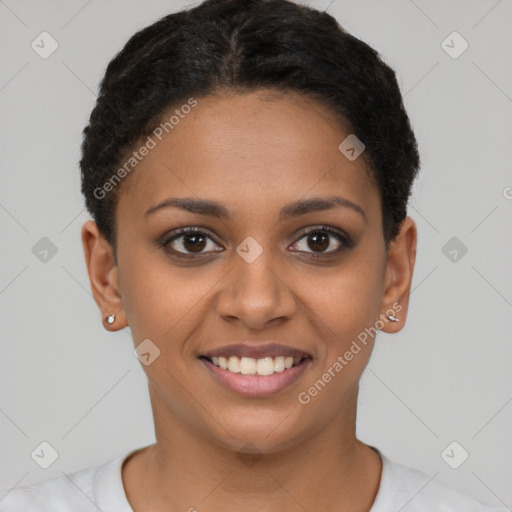 Joyful black young-adult female with short  brown hair and brown eyes