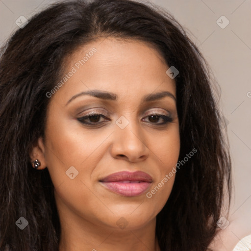 Joyful latino young-adult female with long  brown hair and brown eyes