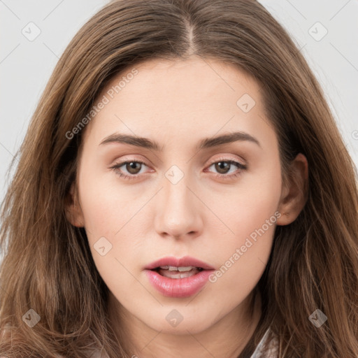 Neutral white young-adult female with long  brown hair and brown eyes