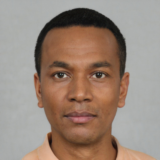 Neutral black young-adult male with short  black hair and brown eyes