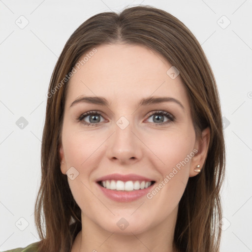 Joyful white young-adult female with long  brown hair and grey eyes